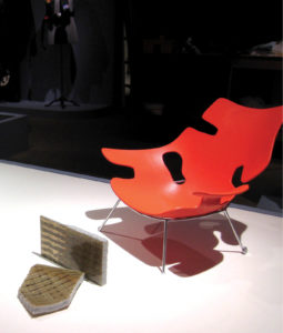 "The Chair of Tomorrow" was originally designed by late modernist architect Ralph Rapson in the 1940's, but was adapted to work with a modern-day techno textile using a 3-dimensional weave product called ZPlex, made by 3Tex. Before Rapson died in March 2008, he settled on a tubular metal cradle with wheels on the back legs to support the composite fabric shell.