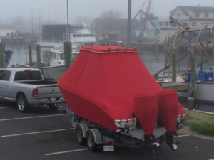 Dubbed “Little Red Riding Hood,” this is a four-part, full-cover system: the top; the bow and pulpit area ending at the midpoint of the boat; the midpoint to the transom area; and the engine covers. The project won an Outstanding Achievement Award for Canvas Experts of Ocean City, Md., in the 2014 MFA Fabrication Excellence Awards.