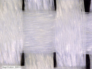 ATEX Technologies’ implantable textiles in a plain weave construction provide durability while allowing tissue integration. This image shows a magnification of 100. Photo: ATEX Technologies Inc.