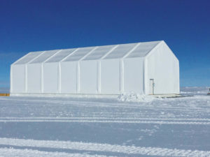 A movable storage and maintenance facility took about a month to erect under extreme conditions in Greenland. Photos: Rubb USA.