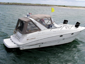 Marine shops can turn out bimini tops and rear enclosures, like the ones on this boat, faster and more accurately using a CAD system to design the parts and to direct the subsequent nesting and cutting activities. Photo: Gerber Technology.