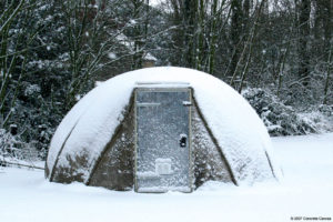 The Concrete Cloth Shelter can withstand a very high distributed compressive load, enabling earth berming by piling sandbags, earth or snow on top. Photo: Concrete Canvas.