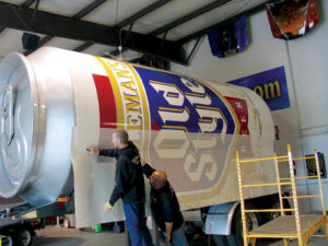 Road Rage Designs wrapped the world's largest beer can in colorful vinyl from Avery Dennison. Photos: Avery Graphics.
