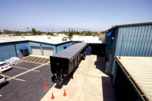 A&R Tarpaulins Inc. manufactured a tarp of multicolored mesh fabric for a 40-foot trailer. Photo: A&R Tarpaulins