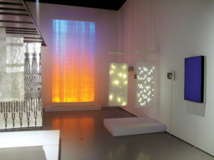 Astrid Krogh’s HORIZON (center); and Aoife Wullur’s Shades of Light (right), luminous room dividers with vertical lines of conductive metal and LEDs attached using wire “spiders” and fixed with tiny magnets. Photo: Astrid Krogh