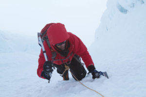 Opposite: Even as retinoschisis began to rob Erik Weihenmayer of his vision at age 13 he made a decision not to let his blindness  hold him back. He embraces personal challenges, such as climbing Alpamayo, a 19,511-foot peak in the Cordillera Blanca in the Peruvian Andes.  As co-founder of the non-profit No Barriers, Weihenmayer promotes and inspires others to shatter barriers in their lives. Photo: Eric Alexander.