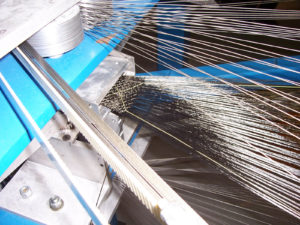 Bally Ribbon Mills has developed a quad-axial loom that allows for the insertion of yarn at 0, 90, +45 and -45 degrees. Photo: Bally Ribbon Mills