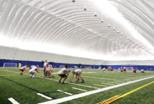At the Stade Hébert Stadium, located in the Ville de Saint-Léonard borough of Montreal, Canada, an air-inflated structure provides enough covered space to accommodate a permanent 11-player soccer field and three 7-player soccer fields, as well as several small-pitch sports such as basketball, volleyball and badminton. Photo: Arizon Structures