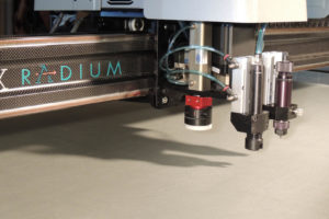 The Argon cutting machine features an adjustable cutting head height for cutting up to 2-inch, low-density materials, as well as a carbon fiber gantry that provides less weight and drag for smoother, faster performance. Photo: Autometrix Inc.