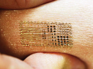 In 2011, new advances in e-textiles or smart textiles are revolutionizing the way scientists and researchers think about the future of fabric. Engineers at the University of Illinois at Urbana-Champaign introduce an ultrathin skin-mounted electronic patch that can use solar cells or wireless coils to power itself.
