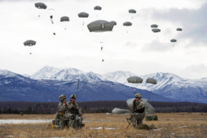 Paratroopers assigned to the 4th Infantry Brigade Combat Team (Airborne), 25th Infantry Division, U.S. Army Alaska, practice a forced-entry parachute assault on Malemute drop zone at Joint Base Elmendorf-Richardson, Alaska, March 18, 2015, as part of a larger tactical field exercise. The Soldiers are part of the Army’s only Pacific airborne brigade with the ability to rapidly deploy worldwide, and are trained to conduct military operations in austere conditions. U.S. Air Force photo/Alejandro Pena