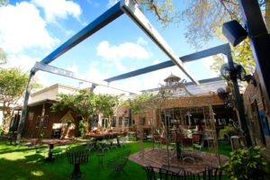 Uni-Systems LLC used TENARA® 4T40HF Architectural Fabric by SEFAR® AG for the retractable canopy that covers the outdoor patio at Louie Bossi’s Ristorante in Fort Lauderdale, Fla.  Photos: Susan (Suki) L. Finnerty, YachtingToday.TV.