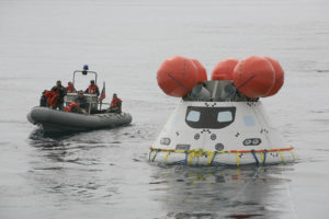 A team of technicians, engineers, sailors and divers practiced in preparation for a successful pickup of the Orion spacecraft, following its December 2014 flight. Photo: NASA