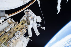 NASA astronaut Tim Kopra is seen floating during a spacewalk on Dec. 21, 2015. NASA astronauts Scott Kelly and Tim Kopra released brake handles on crew equipment carts on either side of the space station’s mobile transporter rail car so it could be latched in place ahead of a docking of a Russian cargo resupply spacecraft. Photo: NASA