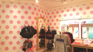 Victoria’s Secret covers walls with DreamScape’s Canvas texture with polka dots to brand their Pink stores. Photo: Roysons Corp.