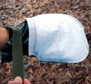 The Individual Equipment Personnel Decontamination Mitt™ can remove more than 90 percent of chemical warfare agents in one pass. Photo: Integrated Textile Solutions. 