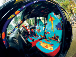 Local artists in Mumbai create original designs for taxi interiors, turning the vehicles into story-telling mediums. Photo: Taxi Fabric.