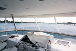 Many customers on the Great Lakes seek weather protection for their boats. Charles Klein, owner of Dorsal LLC, Sturgeon Bay, Wis., connected pieces of clear2sea™ to create window panels (removable and roll-up) for a full enclosure on a 72-ft. Ocean Alexander. Photo: Dorsal LLC.