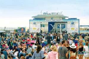 This summer, people packed the sand at Hermosa Beach to hear free music and see movies from a stage outfitted with a polyester knit projection screen, backdrop and accompanying cloth panels. Photo: Tom Underhill.