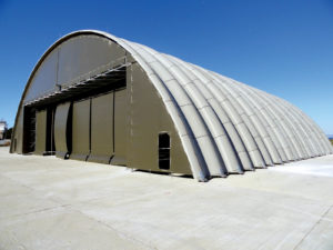 Composite hangars made from panels of polyurethane between glass fiber-reinforced polyester resin are extremely sturdy yet easy to transport, assemble or take down and store. Photo: Hexcel Reinforcements UK.