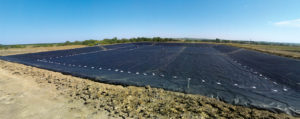 Raven Industries produces a variety of extrusion/cast fabric reinforced geomembrane liners and covers, including the company’s Dura-Skrim waste water lagoon liner. Also available are pond and reservoir liners, landfill and floating covers, brownfield/gas barriers and coal ash containment. Photo: Raven Industries Inc.
