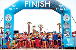Inflatables are popular for race start and finish lines, such as the one shown here in Huntington Beach, Calif., emblazoned with the Roxy name and photos of its fitness clothing. Photo: Bigger Than Life.