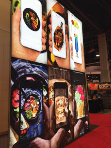 Ultraflex offers a broad range of soft signage solutions for the wide- and the grand-format markets. Shown here are the VorTex Backlit Precision T130, the VorTex Backlit Select T104 and the VorTex Backlit Event T202. Photo taken at the Ultraflex booth at the 2016 SGIA. Photo: Ultraflex Systems Inc.