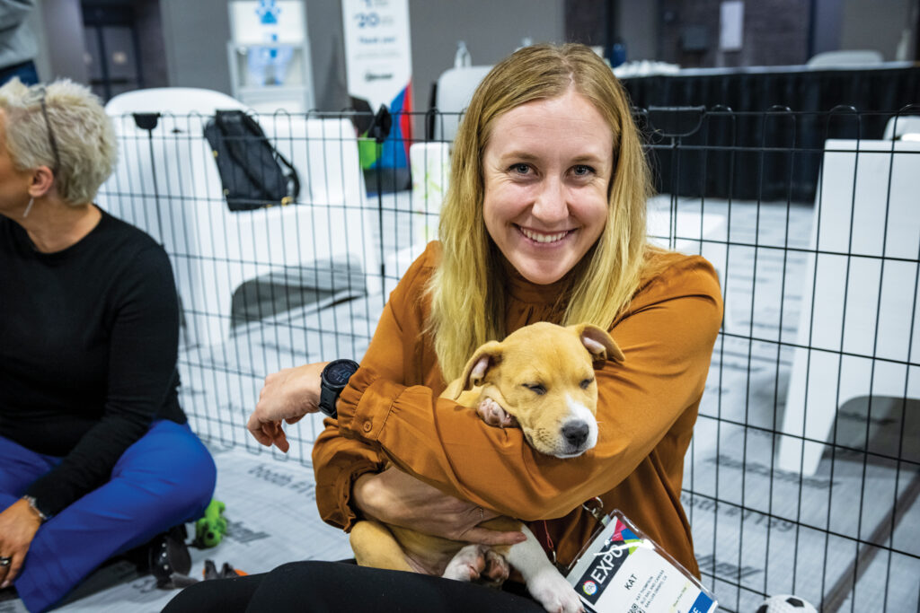 The Pet a Puppy booth returns to Advanced Textiles Expo in 2023.