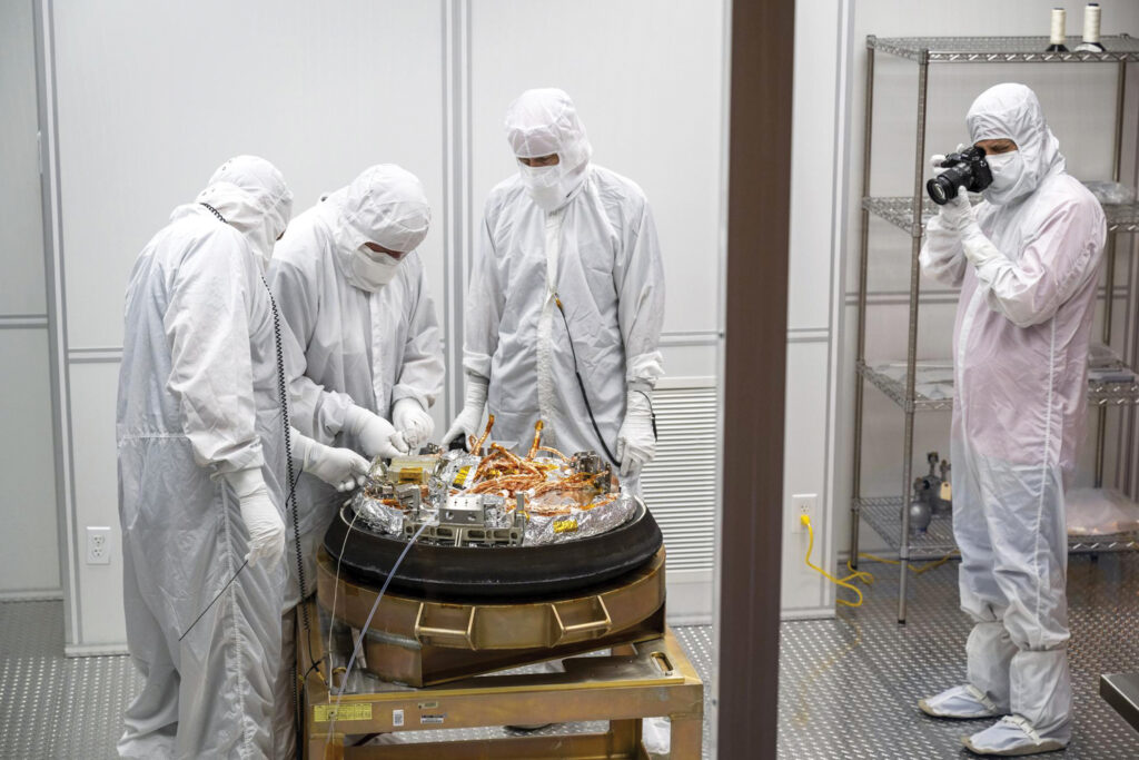 Protective and aerospace textiles are promising areas for domestic manufacturing. Here, curation teams in a clean room process the sample return capsule from NASA’s OSIRIS-REx mission