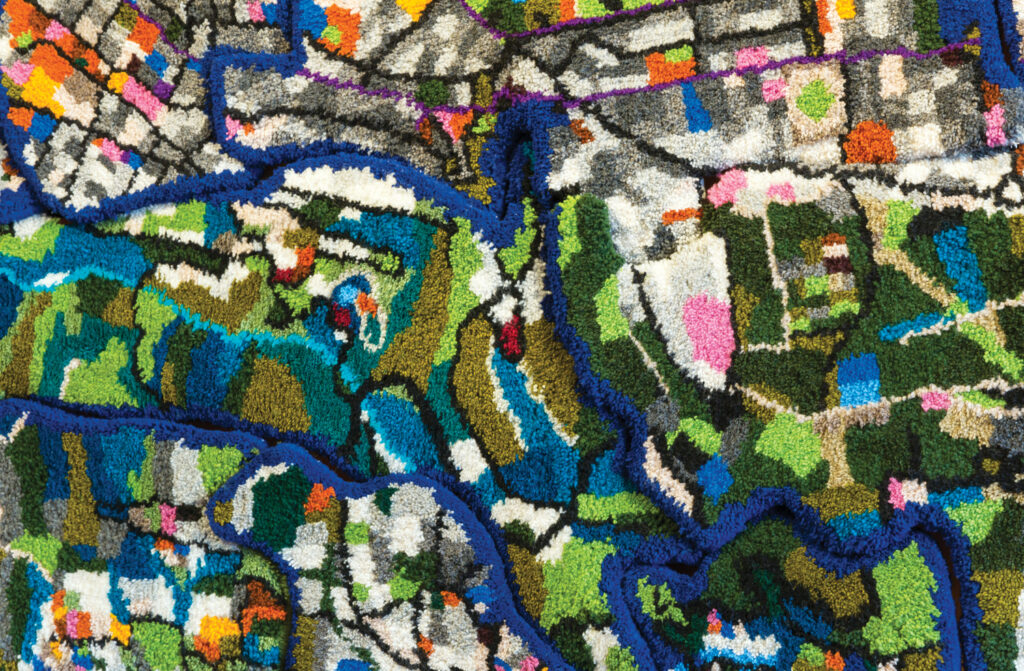 A close-up of the rug artwork Quito Fragmented, which is an abstract work inspired by a map of the city