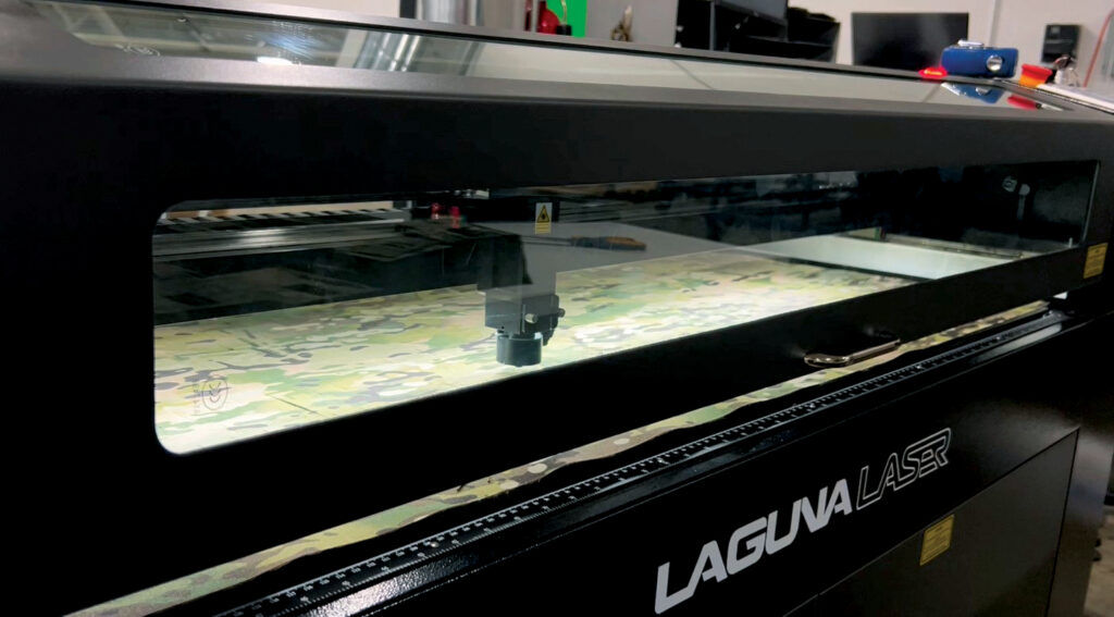 Laser cutting equipment with camo fabric inside