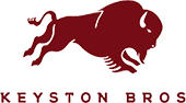 Maroon silhouette of a leaping buffalo above the text "KEYSTON BROS" in matching maroon.