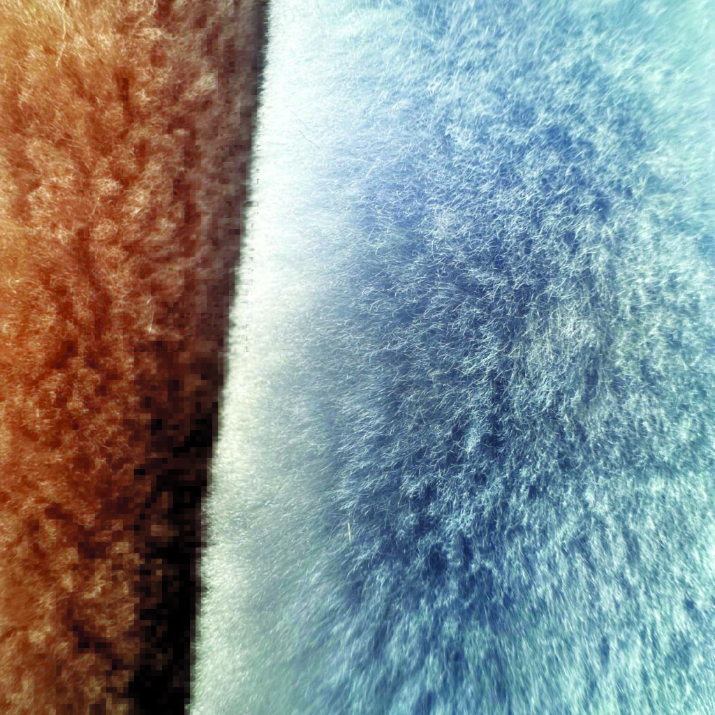 Close-up of textured, bio-based fabrics in warm brown and cool blue hues, showcasing soft, fuzzy surfaces.