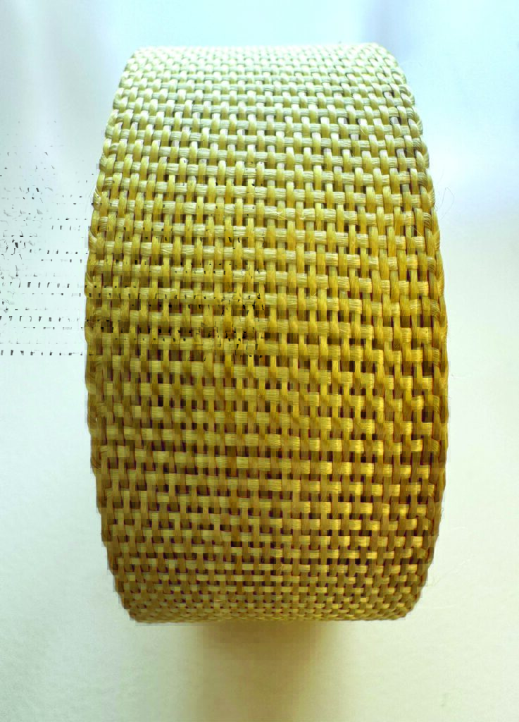 Close-up of a narrow webbing woven using the golden KevlarEXO material, against a soft white background.