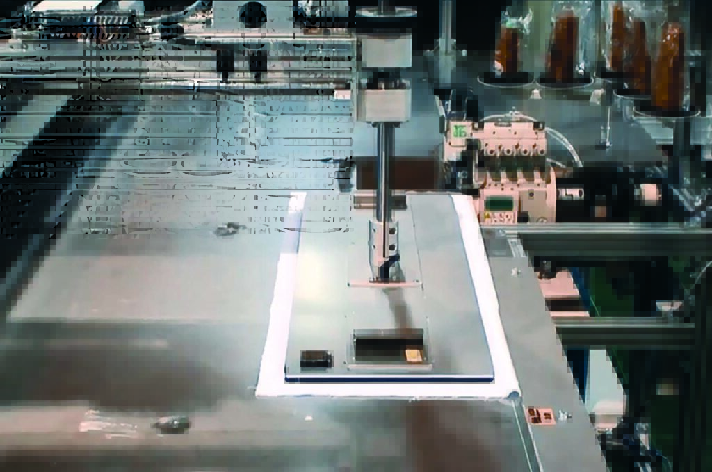 A robot moves a rectangular piece of material around the four sides to sew each side with a single-needle lockstitch walking foot machine with under-thread trimmer, auto foot lift and auto back tack.